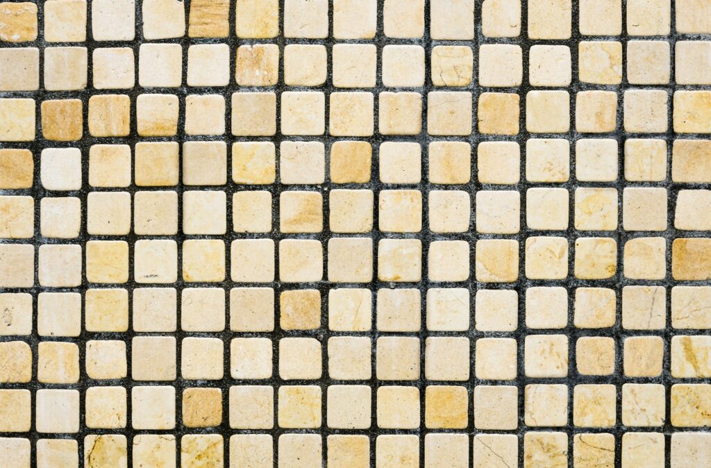 Glass tiles background for shower and toilet furniture